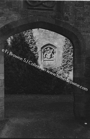 LISMORE CASTLE  CREST THROUGH ARCHWAY NEAR GARDEN